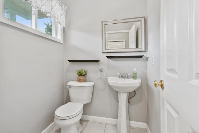 2 Turtle Spring Ln Unit 2, Newtown, CT 06470 - half bath featuring toilet, baseboards, tile patterned flooring, and a sink