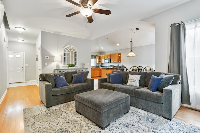 2 Turtle Spring Ln Unit 2, Newtown, CT 06470 - living room with a ceiling fan, lofted ceiling, light wood finished floors, baseboards, and recessed lighting