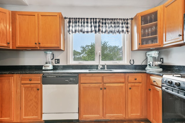 2 Turtle Spring Ln Unit 2, Newtown, CT 06470 - kitchen featuring white dishwasher, a sink, glass insert cabinets, gas range, and dark stone counters