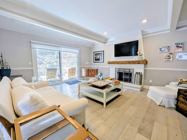 1036 Heritage Vlg Unit A, Southbury, CT 06488 - living room with beamed ceiling, wood finished floors, a fireplace with raised hearth, recessed lighting, and crown molding