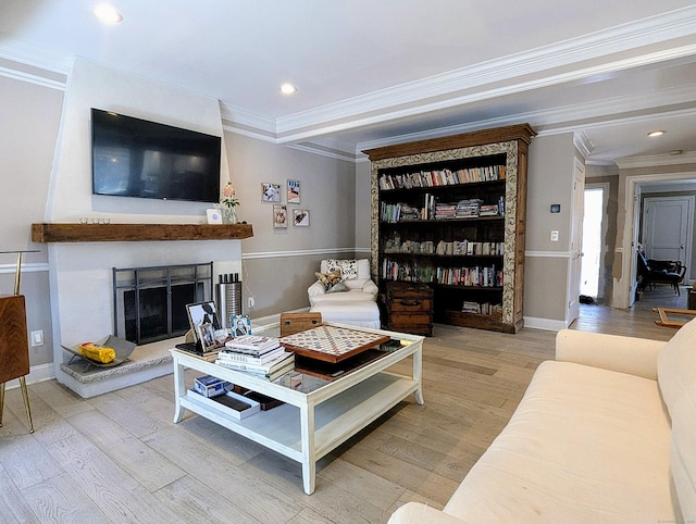 1036 Heritage Vlg Unit A, Southbury, CT 06488 - living area with crown molding, wood finished floors, a fireplace with raised hearth, recessed lighting, and baseboards
