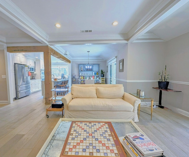 1036 Heritage Vlg Unit A, Southbury, CT 06488 - living area featuring light wood-style flooring, ornamental molding, baseboards, a chandelier, and recessed lighting