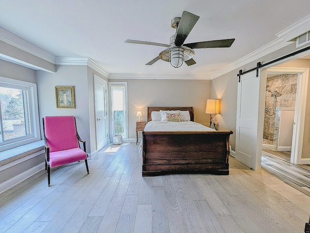 1036 Heritage Vlg Unit A, Southbury, CT 06488 - bedroom with light wood-style flooring, a barn door, crown molding, ceiling fan, and baseboards