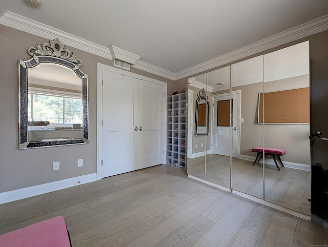 1036 Heritage Vlg Unit A, Southbury, CT 06488 - unfurnished bedroom with wood finished floors, ornamental molding, and baseboards