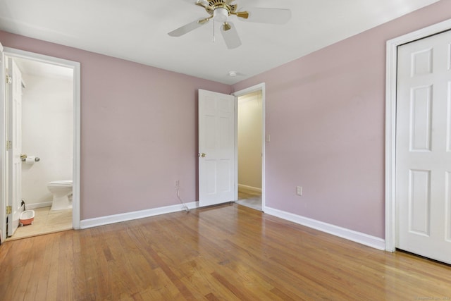 205 Ocean View Ave, Groton, CT 06355 - unfurnished bedroom with baseboards, light wood-style flooring, ensuite bathroom, and a ceiling fan