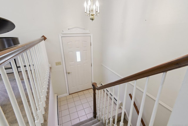 205 Ocean View Ave, Groton, CT 06355 - tiled foyer featuring a chandelier, stairs, and baseboards