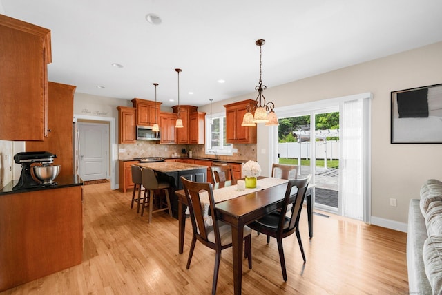 15 Lafountain Rd, Suffield, CT 06078 - dining area featuring light wood-style floors, baseboards, and recessed lighting