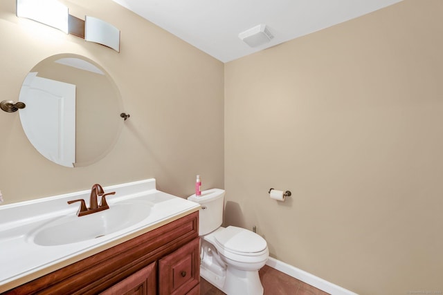 15 Lafountain Rd, Suffield, CT 06078 - half bath featuring vanity, toilet, tile patterned floors, and baseboards
