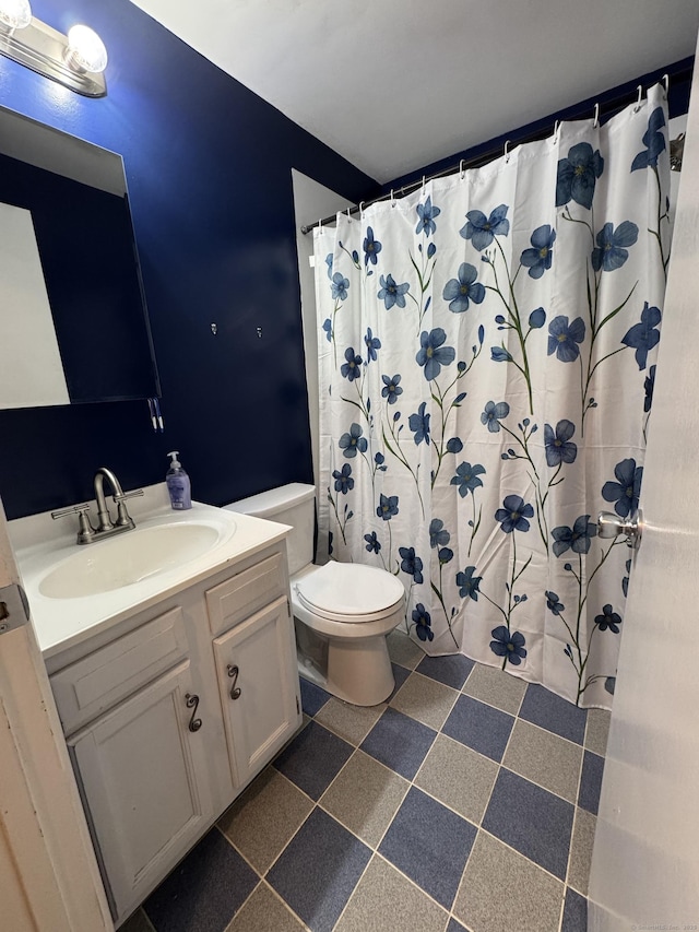 68 Evergreene Unit 68, Wallingford, CT 06492 - full bathroom featuring toilet, vanity, and tile patterned floors