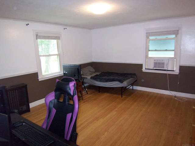 28 Terrace Ave, East Hartford, CT 06108 - bedroom featuring wood finished floors and cooling unit
