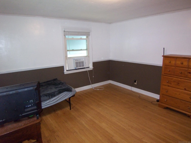 28 Terrace Ave, East Hartford, CT 06108 - unfurnished bedroom with wood finished floors and cooling unit