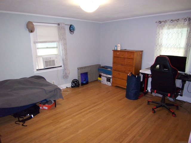 28 Terrace Ave, East Hartford, CT 06108 - bedroom featuring radiator, light wood-style flooring, and crown molding