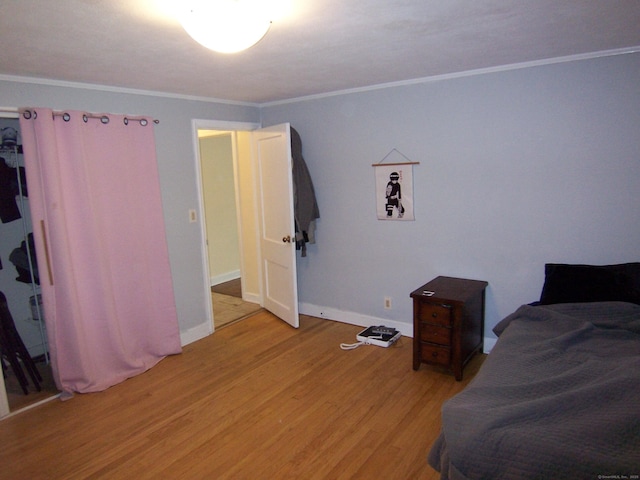 28 Terrace Ave, East Hartford, CT 06108 - bedroom featuring light wood-type flooring and crown molding