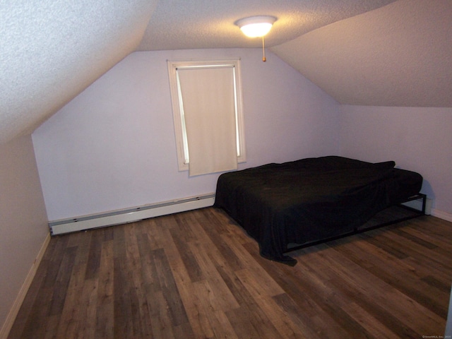 28 Terrace Ave, East Hartford, CT 06108 - bedroom with a textured ceiling, a baseboard radiator, vaulted ceiling, and wood finished floors