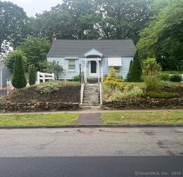 28 Terrace Ave, East Hartford, CT 06108 - view of front facade featuring a chimney