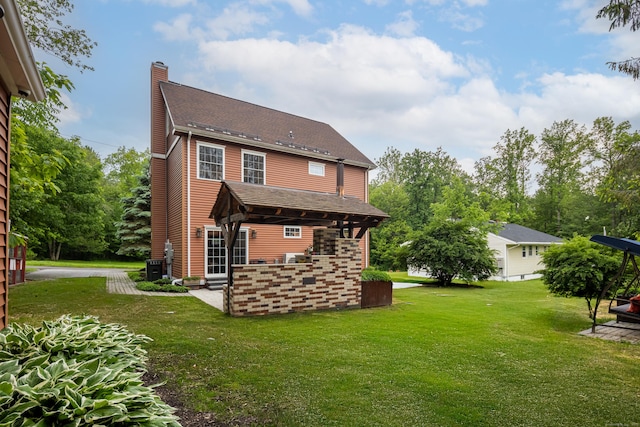 9 Purdum Rd, New Fairfield, CT 06812 - rear view of property featuring a chimney and a lawn