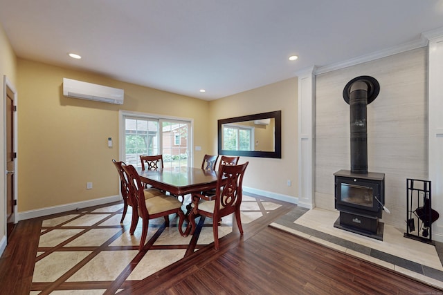 9 Purdum Rd, New Fairfield, CT 06812 - dining room with a wall unit AC, baseboards, recessed lighting, inlaid floor details, and wood finished floors