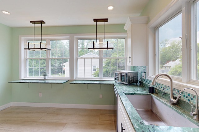 9 Purdum Rd, New Fairfield, CT 06812 - kitchen with a sink, plenty of natural light, a chandelier, and recessed lighting