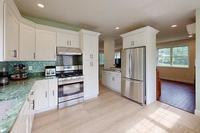 9 Purdum Rd, New Fairfield, CT 06812 - kitchen featuring stainless steel appliances, under cabinet range hood, tasteful backsplash, white cabinets, and recessed lighting