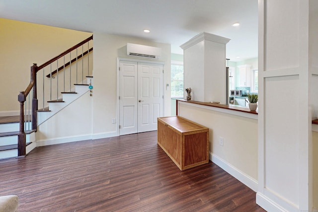 9 Purdum Rd, New Fairfield, CT 06812 - entrance foyer with a wall mounted AC, dark wood-style flooring, stairway, recessed lighting, and baseboards