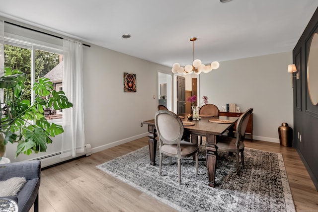 89 Goose Green Rd, Barkhamsted, CT 06063 - dining space featuring a chandelier, light wood finished floors, a baseboard radiator, and baseboards