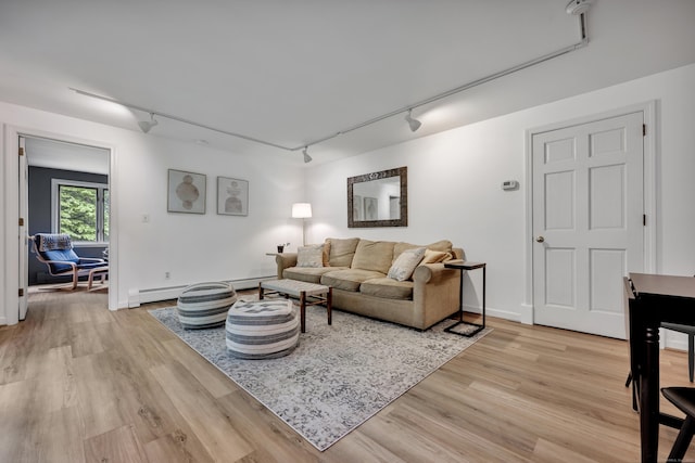 89 Goose Green Rd, Barkhamsted, CT 06063 - living area featuring rail lighting, light wood-style floors, and baseboard heating