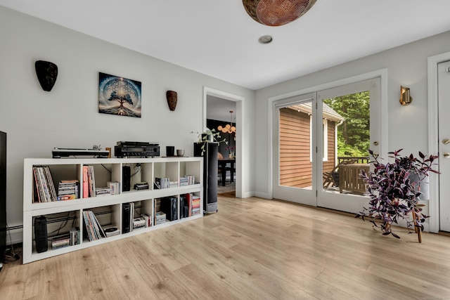 89 Goose Green Rd, Barkhamsted, CT 06063 - living area featuring wood finished floors, baseboards, and a baseboard heating unit