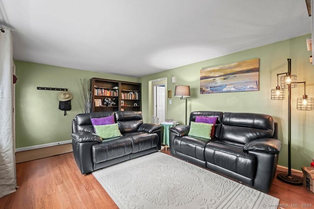 525 Park Ave, Windsor, CT 06095 - living area featuring wood finished floors and baseboards