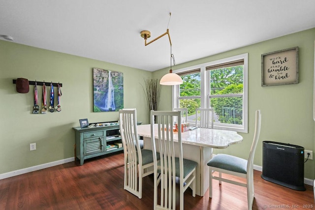 525 Park Ave, Windsor, CT 06095 - dining area featuring baseboards and dark wood-style floors