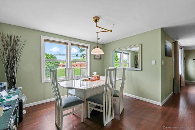 525 Park Ave, Windsor, CT 06095 - dining area featuring dark wood finished floors and baseboards