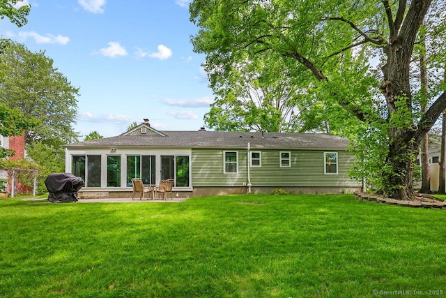 525 Park Ave, Windsor, CT 06095 - back of house featuring a patio area and a yard