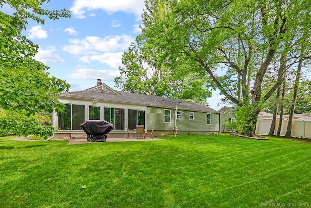 525 Park Ave, Windsor, CT 06095 - rear view of house featuring a patio area and a chimney