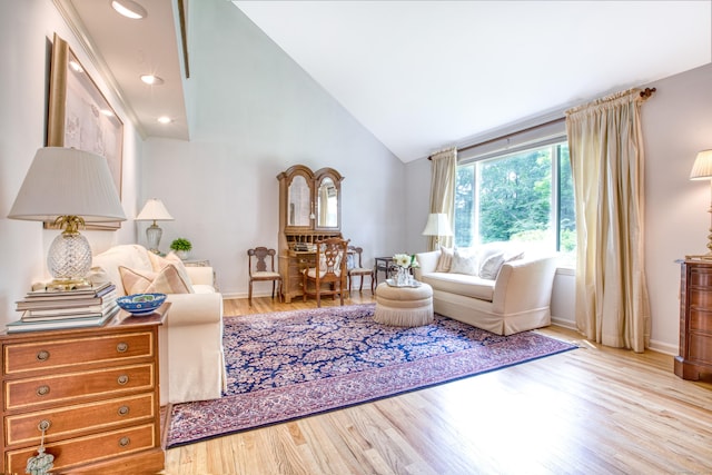 510 W Lyon Farm Dr Unit 510, Greenwich, CT 06831 - living area featuring wood finished floors, baseboards, and high vaulted ceiling