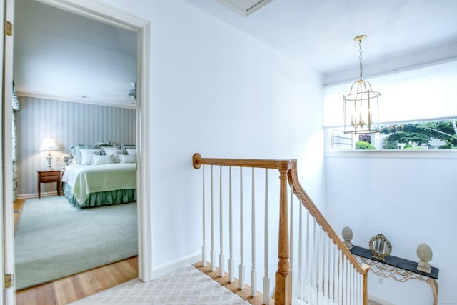 510 W Lyon Farm Dr Unit 510, Greenwich, CT 06831 - hall featuring an upstairs landing, a chandelier, baseboards, and wood finished floors
