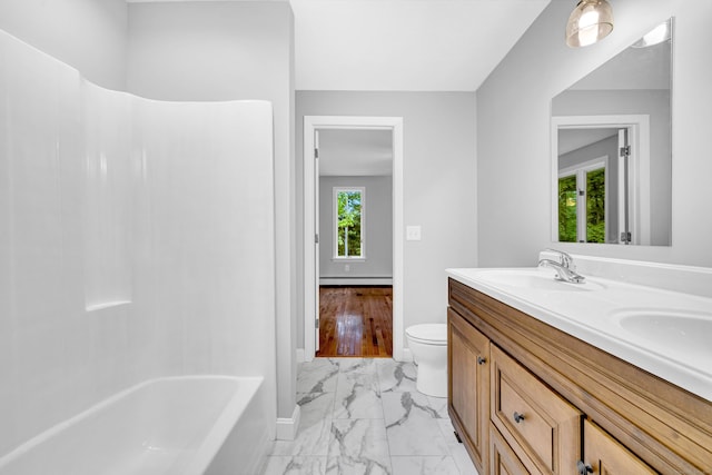53 Windham Rd, Hampton, CT 06247 - bathroom featuring marble finish flooring, a baseboard heating unit, double vanity, toilet, and  shower combination