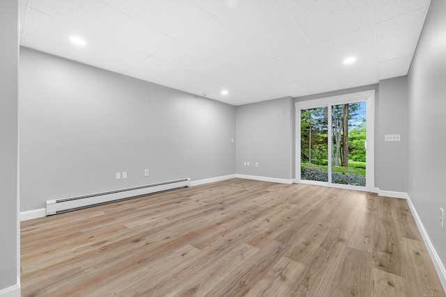 53 Windham Rd, Hampton, CT 06247 - empty room with baseboard heating, baseboards, light wood-style floors, and recessed lighting