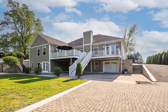 125 Stadley Rough Rd, Danbury, CT 06811 - view of front of home with stairs, french doors, decorative driveway, and an attached garage