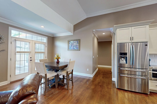 125 Stadley Rough Rd, Danbury, CT 06811 - dining space featuring crown molding, wood finished floors, baseboards, french doors, and vaulted ceiling