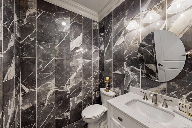 125 Stadley Rough Rd, Danbury, CT 06811 - bathroom with ornamental molding, tile walls, vanity, and toilet