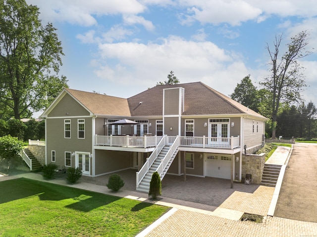 125 Stadley Rough Rd, Danbury, CT 06811 - back of property featuring stairs, french doors, and decorative driveway