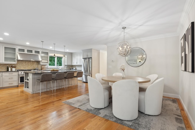 24 Pine Mountain Rd, Redding, CT 06896 - dining space with a chandelier, light wood-type flooring, ornamental molding, recessed lighting, and baseboards