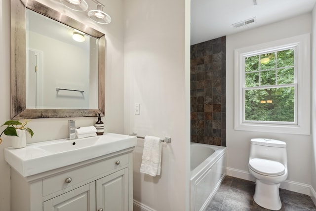 24 Pine Mountain Rd, Redding, CT 06896 - bathroom with baseboards, stone tile flooring, vanity, and toilet