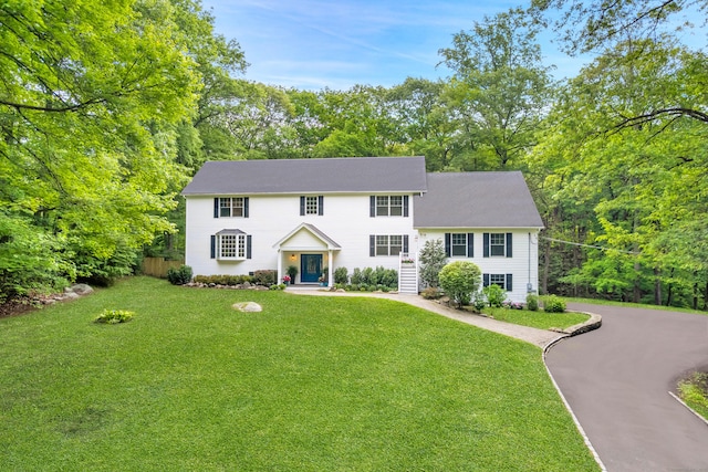 24 Pine Mountain Rd, Redding, CT 06896 - colonial house featuring a front lawn and driveway