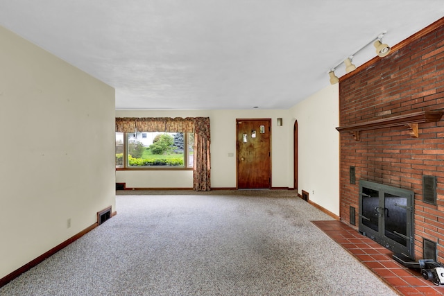 5 Reservoir Rd, Norwich, CT 06360 - unfurnished living room featuring carpet, a fireplace, and baseboards