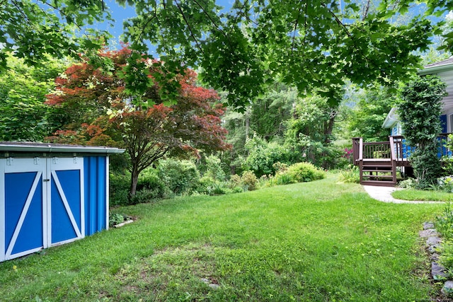 5 Reservoir Rd, Norwich, CT 06360 - view of green lawn with a wooden deck
