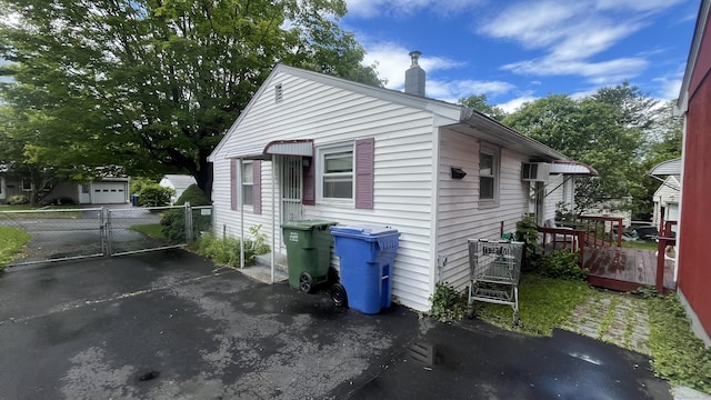 40 Batt St, Middletown, CT 06457 - view of property exterior featuring a chimney and a gate