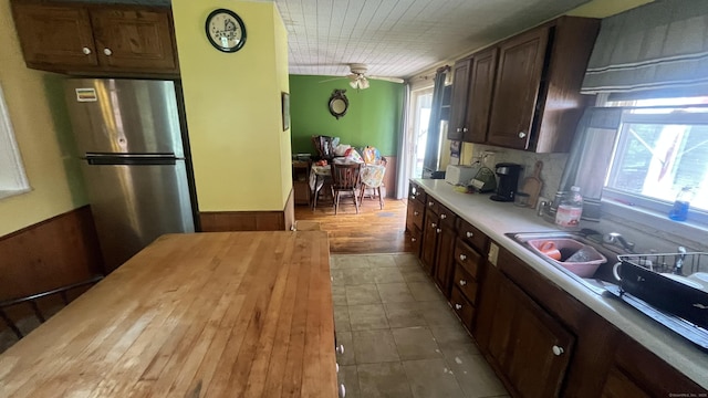 40 Batt St, Middletown, CT 06457 - kitchen featuring freestanding refrigerator, butcher block countertops, and dark brown cabinetry