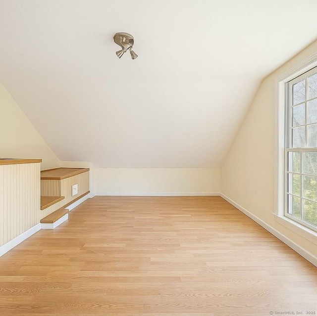 10 Secor Rd, Brookfield, CT 06804 - additional living space featuring light wood-style floors, lofted ceiling, and baseboards