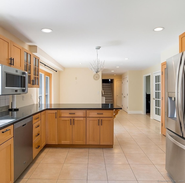 10 Secor Rd, Brookfield, CT 06804 - kitchen with appliances with stainless steel finishes, a peninsula, dark countertops, glass insert cabinets, and recessed lighting
