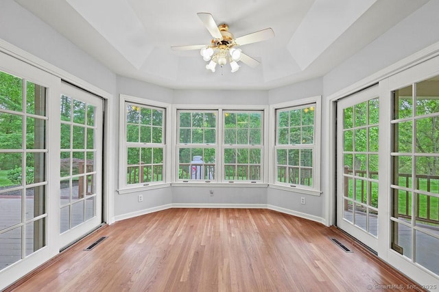 657 Tamarack Rd, Cheshire, CT 06410 - unfurnished sunroom featuring french doors, baseboards, wood finished floors, and a tray ceiling